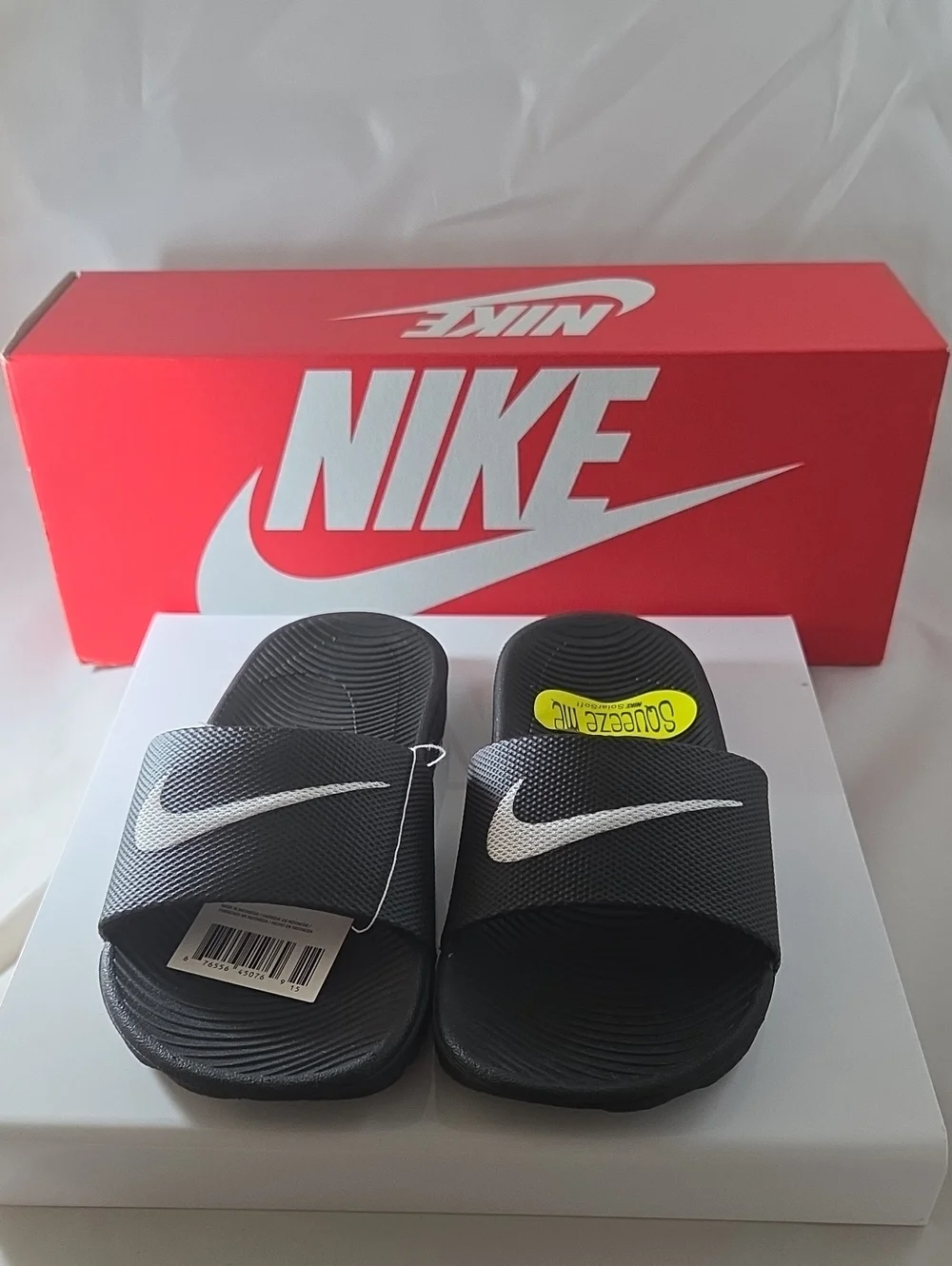 Nike Kids Black Slide Sandals with White Swoosh